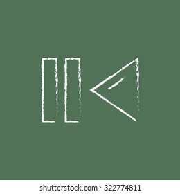Pause and playback button hand drawn in chalk on a blackboard vector white icon isolated on a green background.