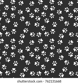 Paw footprint vector dark seamless pattern or texture