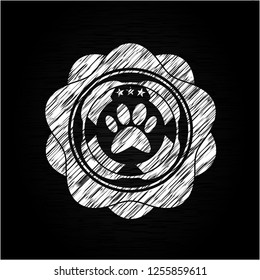 paw icon drawn on blackboard