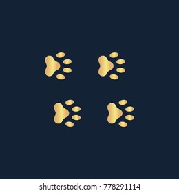 Paw icon flat. Simple gold pictogram on dark background. Vector illustration symbol