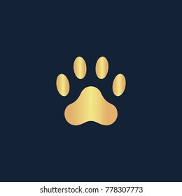 Paw icon flat. Simple gold pictogram on dark background. Vector illustration symbol