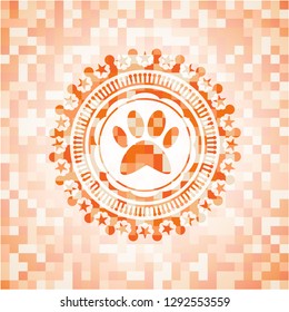 paw icon inside abstract orange mosaic emblem