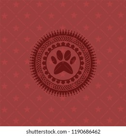 paw icon inside badge with red background