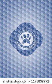 paw icon inside blue badge with geometric pattern.