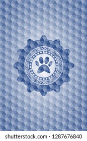 paw icon inside blue badge with geometric background.