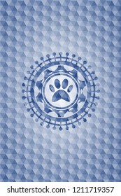 paw icon inside blue emblem or badge with abstract geometric pattern background.