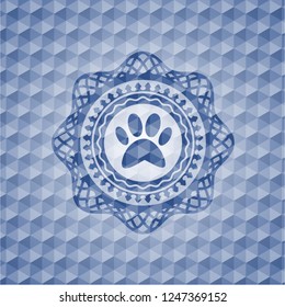 paw icon inside blue emblem with geometric background.