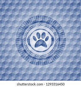 paw icon inside blue emblem with geometric background.