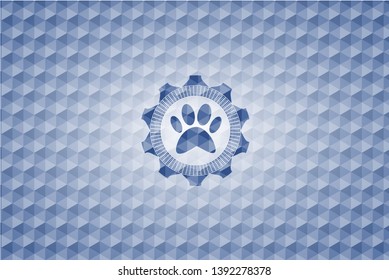 paw icon inside blue emblem with geometric pattern.