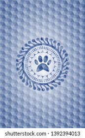 paw icon inside blue polygonal emblem.