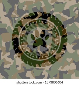 paw icon inside camo emblem