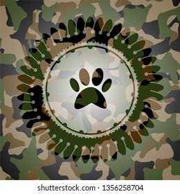 paw icon inside camouflage texture