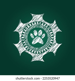 paw icon inside chalkboard emblem. 