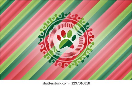 paw icon inside christmas badge background.