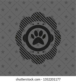paw icon inside dark emblem