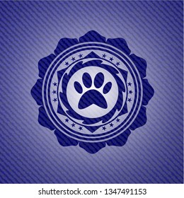paw icon inside emblem with jean high quality background