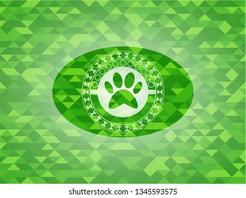 paw icon inside green emblem. Mosaic background