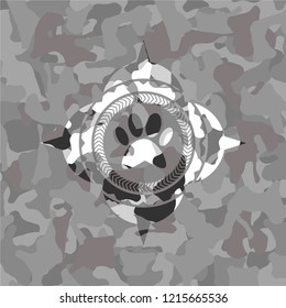 paw icon inside grey camo texture