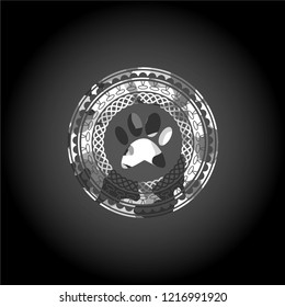 paw icon inside grey camo emblem