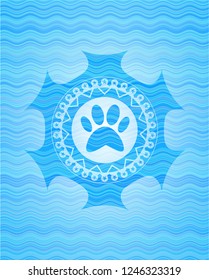 paw icon inside light blue water wave style badge.