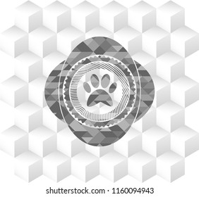 paw icon inside realistic grey emblem with geometric cube white background