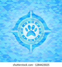 paw icon inside realistic light blue mosaic emblem