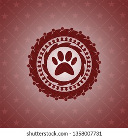 paw icon inside realistic red emblem