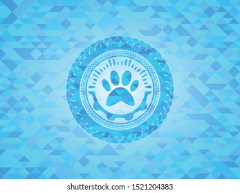 paw icon inside realistic sky blue mosaic emblem