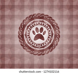 paw icon inside red seamless badge with geometric background.