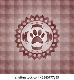 paw icon inside red seamless emblem or badge with abstract geometric pattern background.