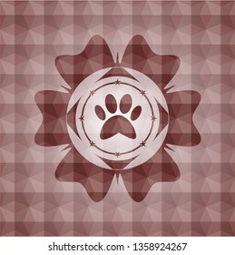 paw icon inside red seamless geometric emblem.