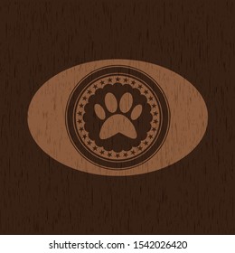 paw icon inside retro wooden emblem