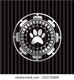 paw icon inside silver badge