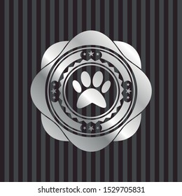 paw icon inside silvery emblem or badge