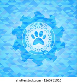 paw icon inside sky blue mosaic emblem