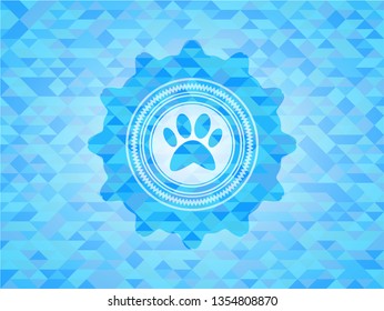 paw icon inside sky blue emblem with mosaic ecological style background