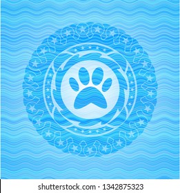 paw icon inside water representation emblem background.