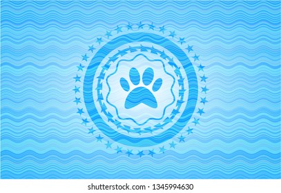 paw icon inside water wave style emblem.
