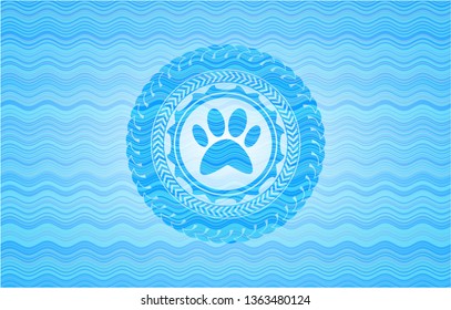 paw icon inside water wave concept style badge.