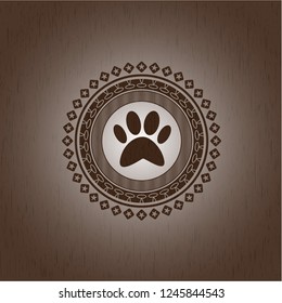 paw icon inside wood emblem. Retro