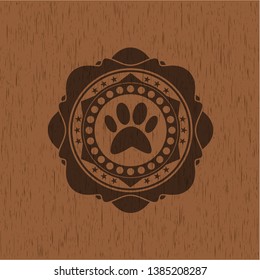 paw icon inside wood emblem. Vintage.