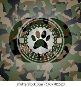 paw icon on camo pattern