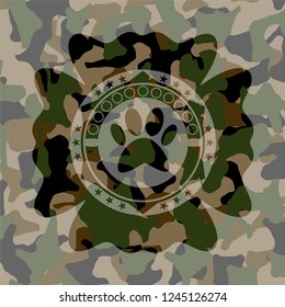 paw icon on camo texture
