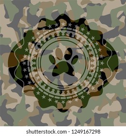 paw icon on camouflaged pattern