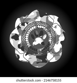 paw icon on grey camouflage texture. 