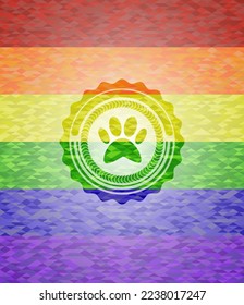 paw icon on mosaic background with the colors of the LGBT flag. 