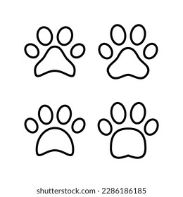 Paw icon vector illustration. paw print sign and symbol. dog or cat paw