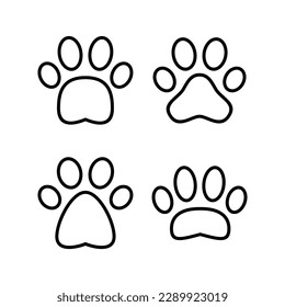 Paw icon vector illustration. paw print sign and symbol. dog or cat paw