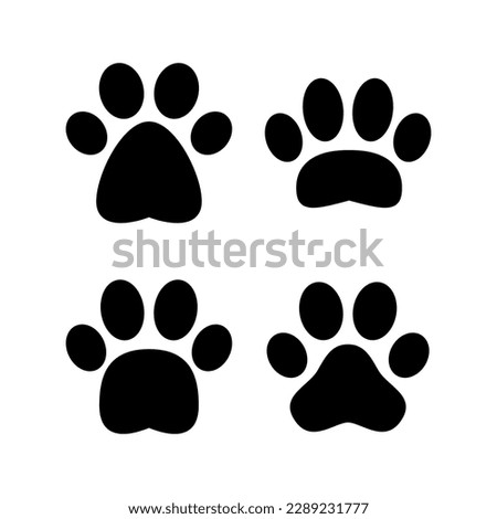 Paw icon vector illustration. paw print sign and symbol. dog or cat paw