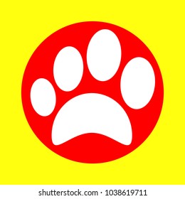 Paw icon. Veterinary or pet shop emblem. Vector. White flat icon inside red circle at yellow background. Isolated.